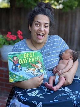 Leah Nixon with her book (and her baby)