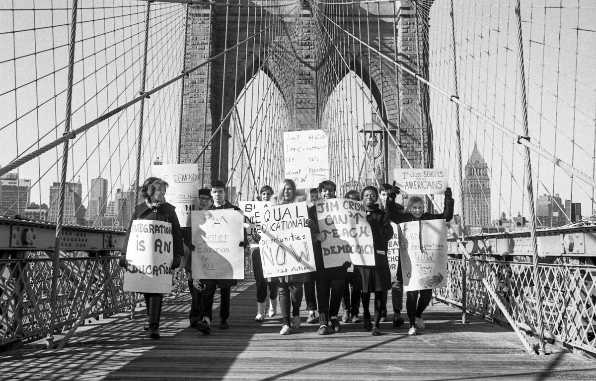 New York City School Boycott, February 3, 1964. Picketers march across the Brooklyn Bridge en route from City Hall to the Board of Education in Brooklyn to protest de facto segregation in the city’s school system. More than one-third of New York City public school children boycotted.Bettmann Archive/Getty Images