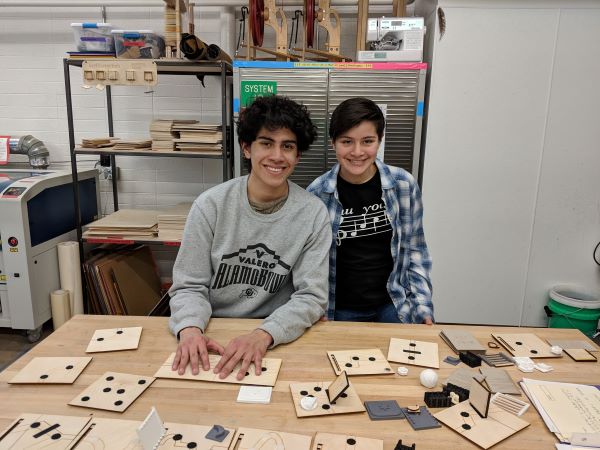 Jeronimo and Atzin Palacios Luna with their board game